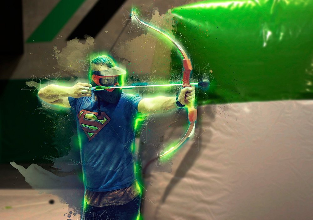 A player in a Superman tee drawing a bow mid-battle at the Archery Attack arena in Reservoir, Melbourne