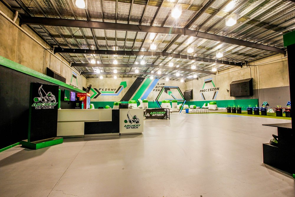 The reception desk and main battlefield at Archery Attack's indoor Arrow Tag arena in Reservoir, Melbourne